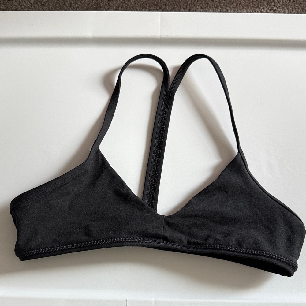 Fleo black size M sports bra. New. Washed but never worn.